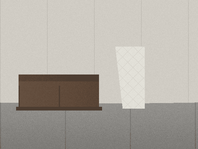Fabricated demo photo: couch and mattress in a garage